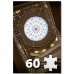 Photo of funk skylight with puzzle piece, and the number 60, indicating a 60 piece puzzle