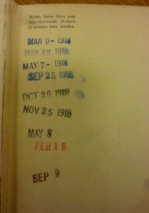 Checkout dates stamped on endpaper