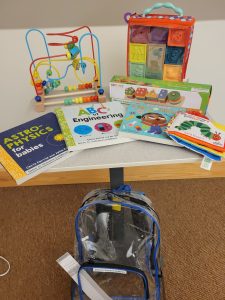 Contents of Intro to science backpack placed on table.