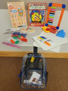 Contents of Building backpack placed on table.