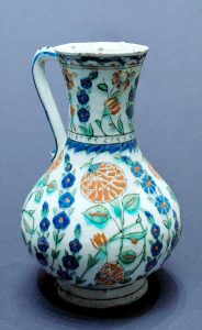 An Iznik made pitcher with flower decoration from the Ottoman Empire circa 1560-1570.