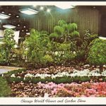 Postcard showing a display of trees and flower beds at the Chicago World Flower and Garden Show.