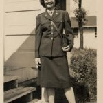 Black and white photo of Rose "Rosebud" Pieper, smiling at camera, wearing World War II-era Army Nurse Corp uniform