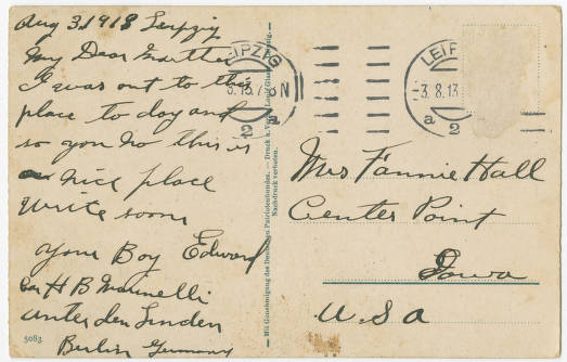 color back of postcard with hand written letter