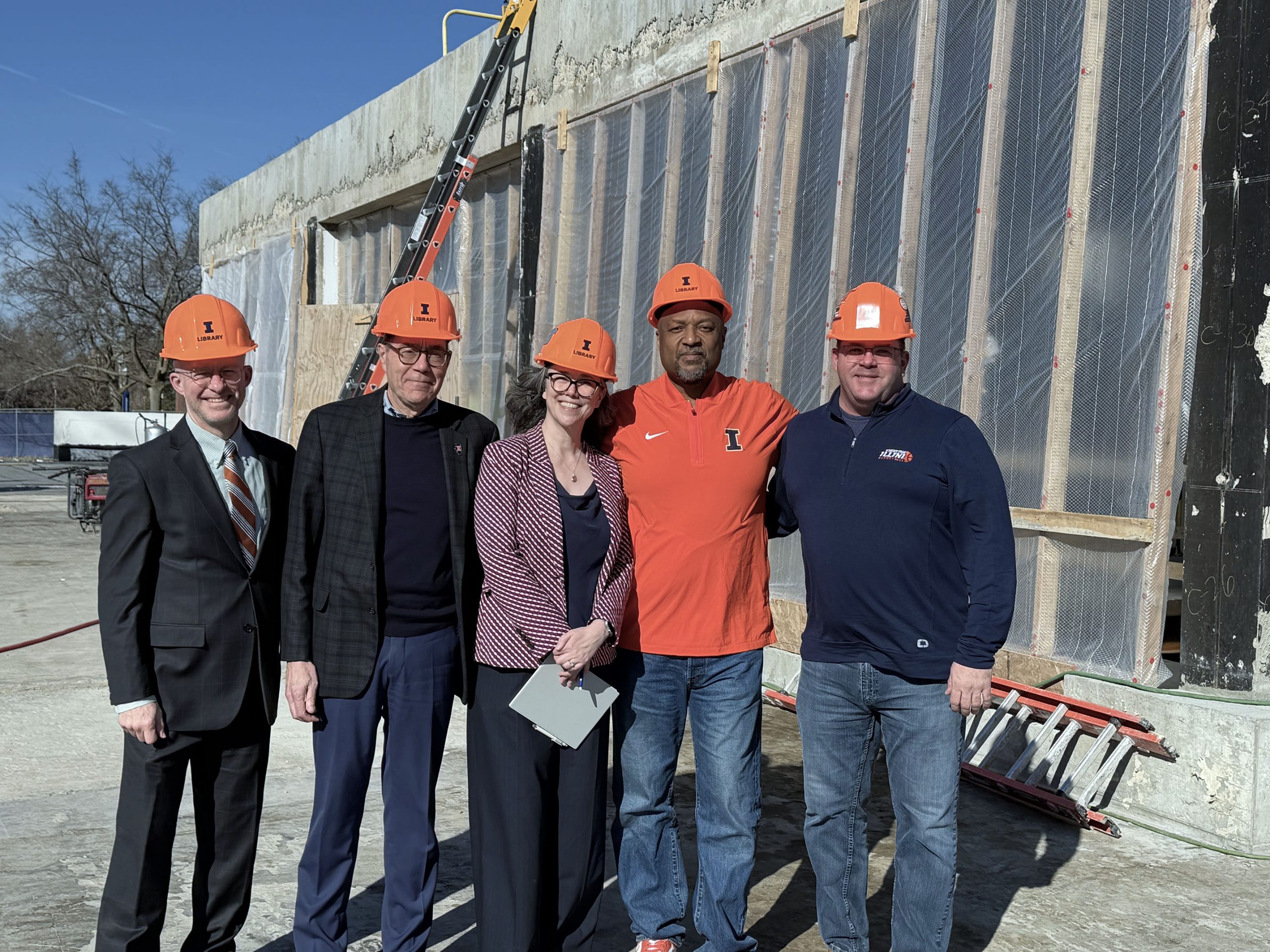 Associate Dean of Libraries Tom Teper, Provost John Coleman, Dean of Libraries Claire Stewart, Chancellor Charles L. Isbell, Jr., and Assistant Dean of Libraries for Facilities Tim Newman visit the construction site of the Archives and Special Collections building.