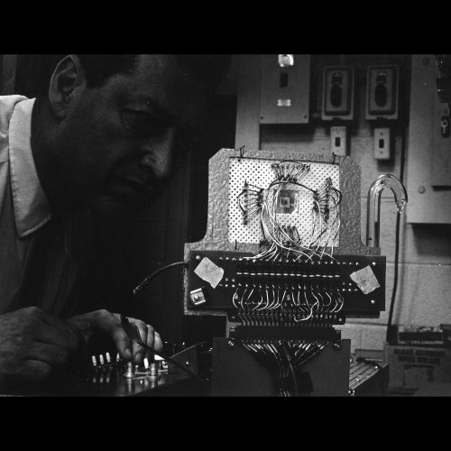 Hiram Gene Slottow, Professor of Electrical Engineering, working on a circuit, 1961.