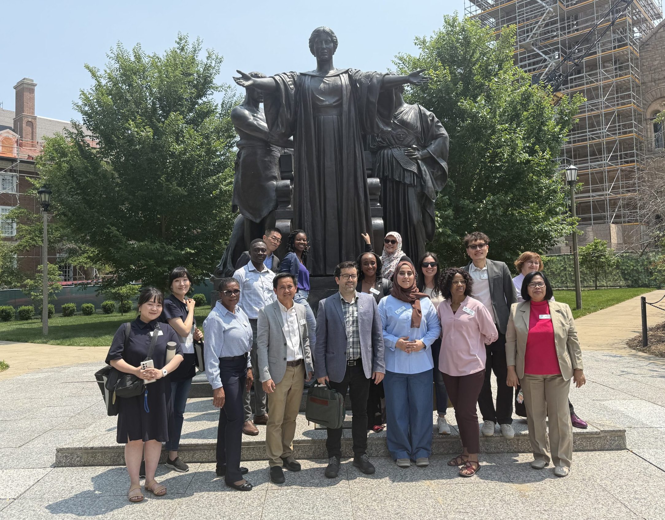 Mortenson Associates infront of alma mater