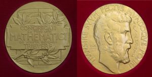 The front and back images of the Fields Medal. One side has writing and an image of laurels. The other side has an image of a bearded man's face in profile.