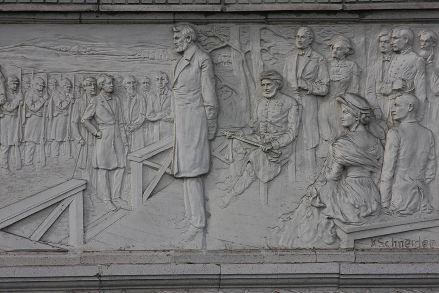One of sculptor Kristian Schneider's terra cotta panels on the exterior of Lincoln Hall.