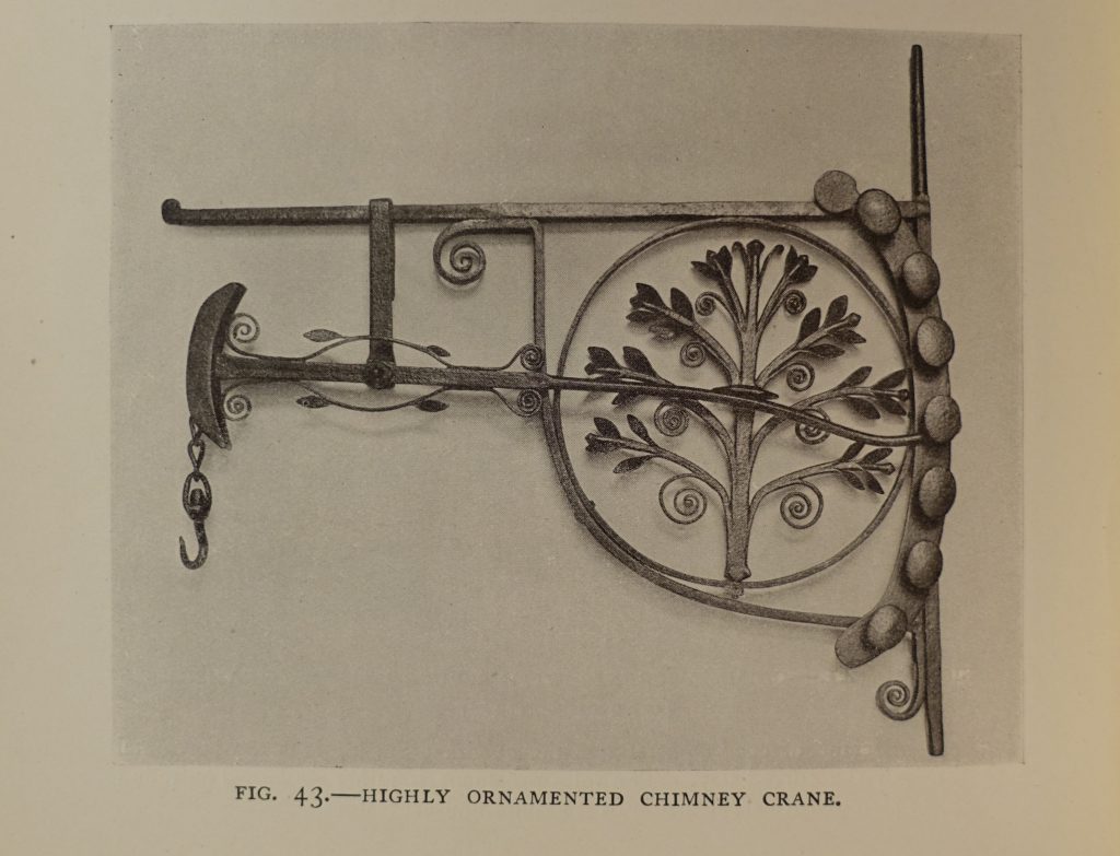 An ornamental chimney crane