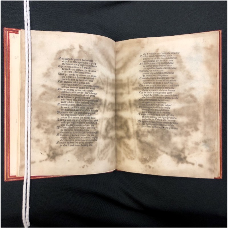 Book open to pages with single column text.