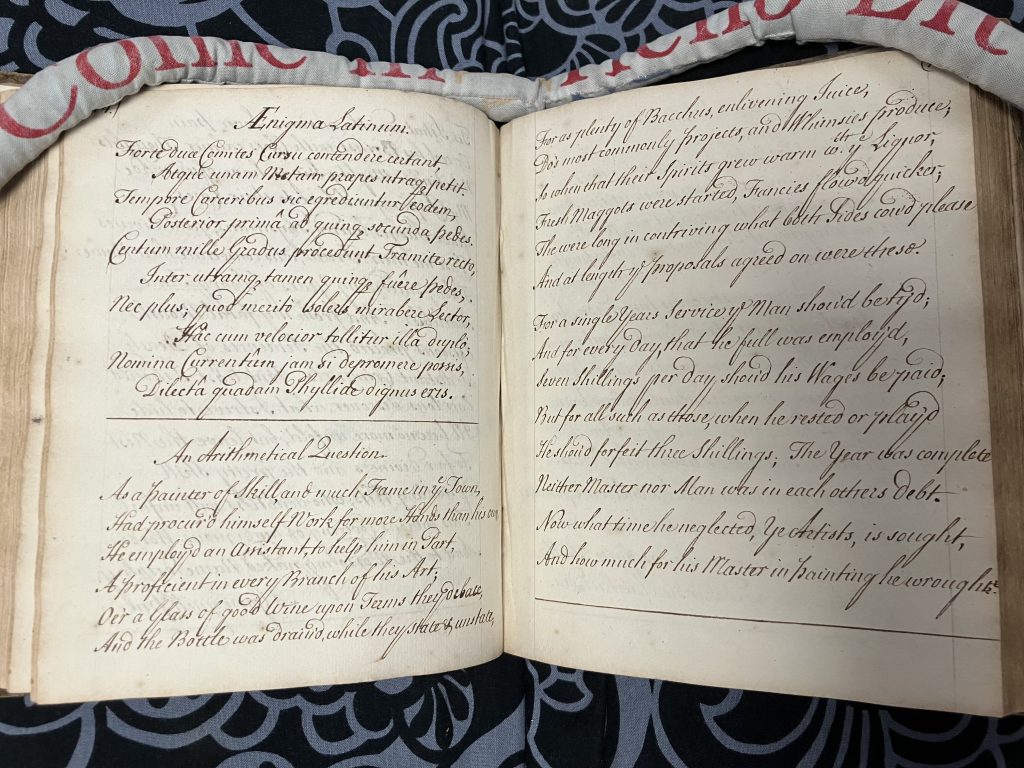 Two-page spread, showing handwritten poems, “Aenigma Latinum” and “An arithmetical question.”