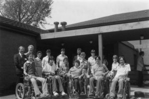 Beckwith Hall residents and rehabilitation staff at the dedication ceremony in 1982.