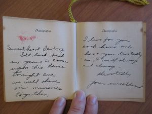 A note from Virginia to Homer, written inside the dance card from the Officer's Ball, held on January 19, 1935. Record Series 41/20/247.
