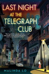 Book cover of Last Night at the Telegraph Club by Malinda Lo. Two girls stand under a streetlamp in Chinatown in San Francisco in the foreground, with a cable car going up a steep hill in the background.